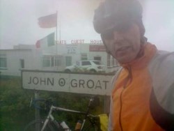 Kevin at John o'Groats preparing to cycle to Lands End
