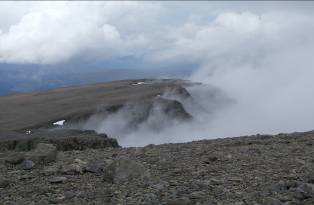 Cloud hits the edge of the plateau