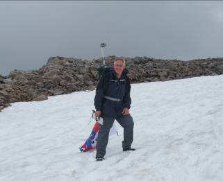 Ian descending the snowbank on McLeans Steep