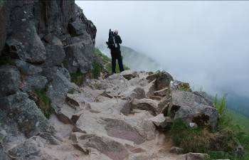 Adrian surveys the next stretch of path as Ben Nevis